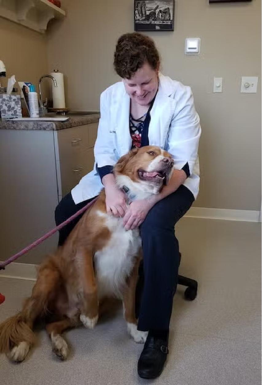 Photo of Dr. Nicole LaMora Examining a Patient